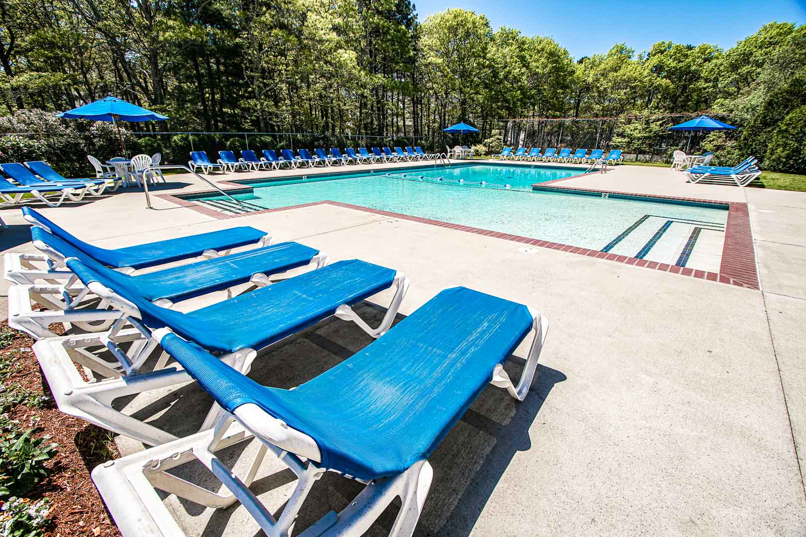 A peaceful outdoor swimming pool at VRI's Sea Mist Resort in Massachusetts.